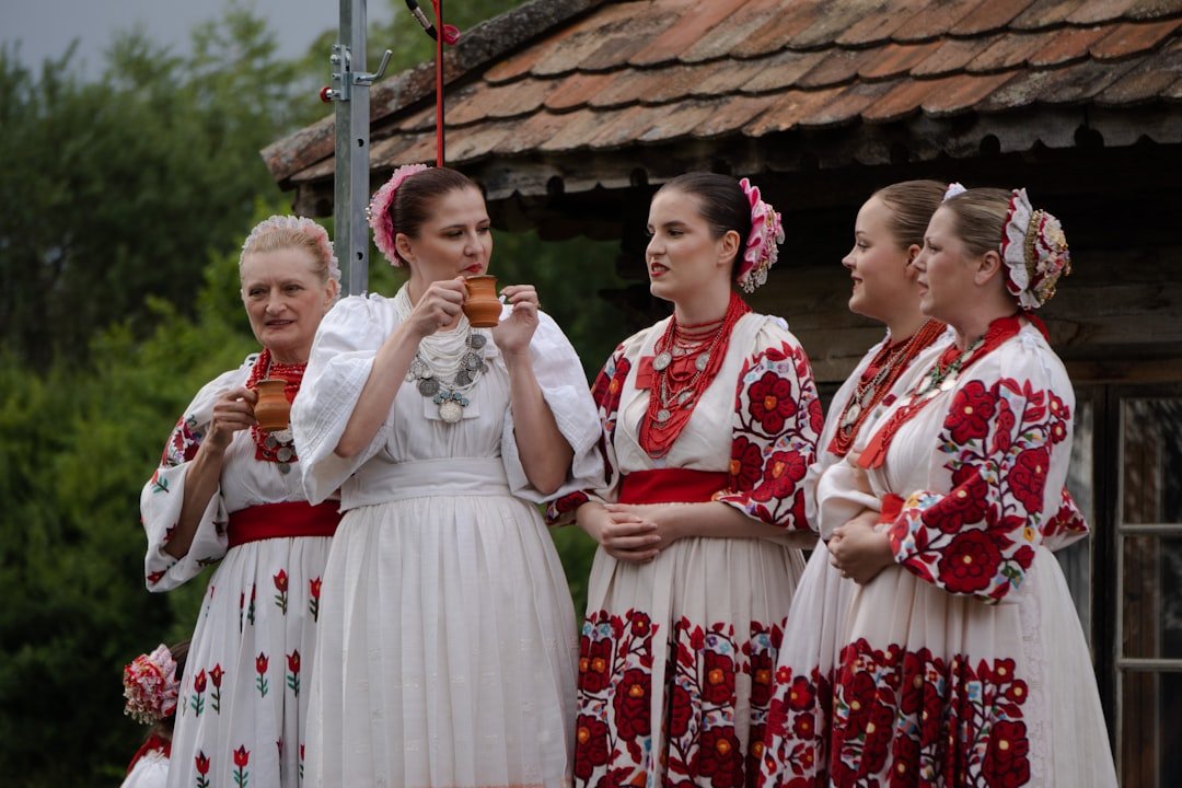 a group of women standing next to each other
