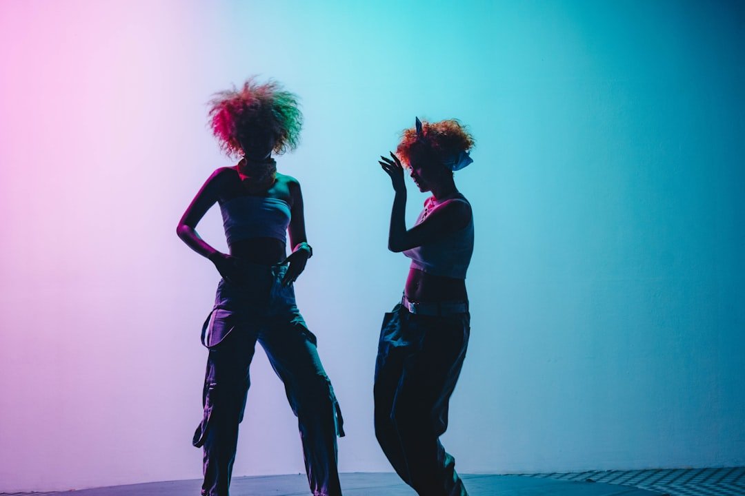 a couple of women standing next to each other